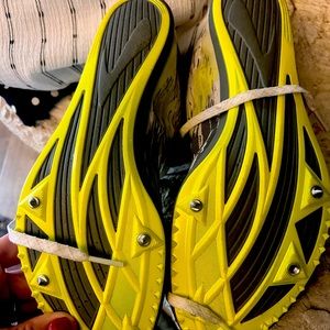 Track shoes by Brooks.  Child wore them total of 5 times.  Bought for 200.00